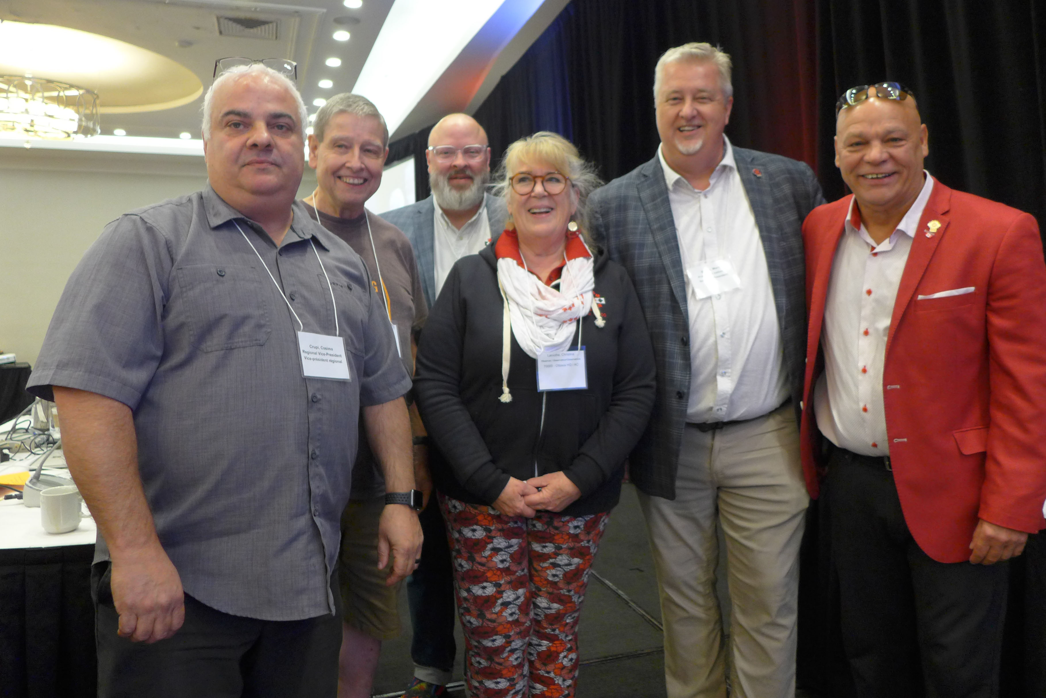 Brother Cosimo Crupi, former Chair of the Honours and Awards Committee presented a 20-year Service pin to Christina Lamothe, Local 70000 Ottawa Headquarters. 