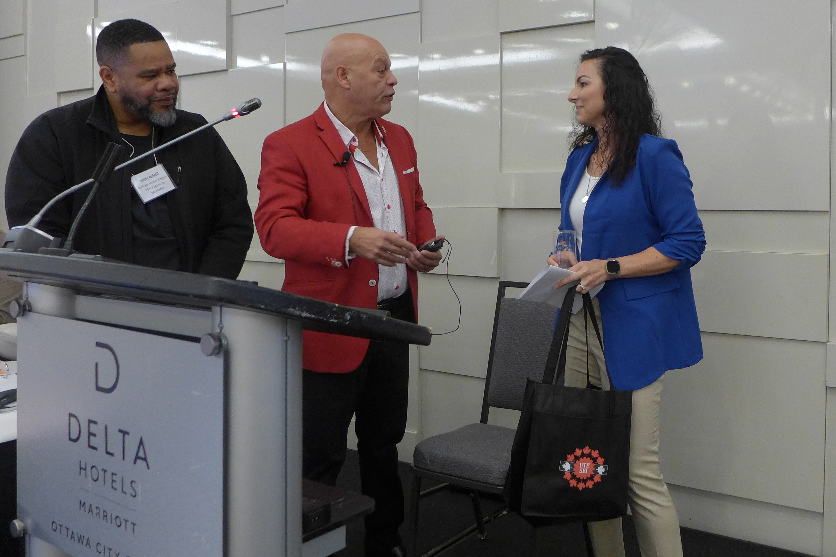 Natalie Waples receives a thank-you gift from Doug Gaetz