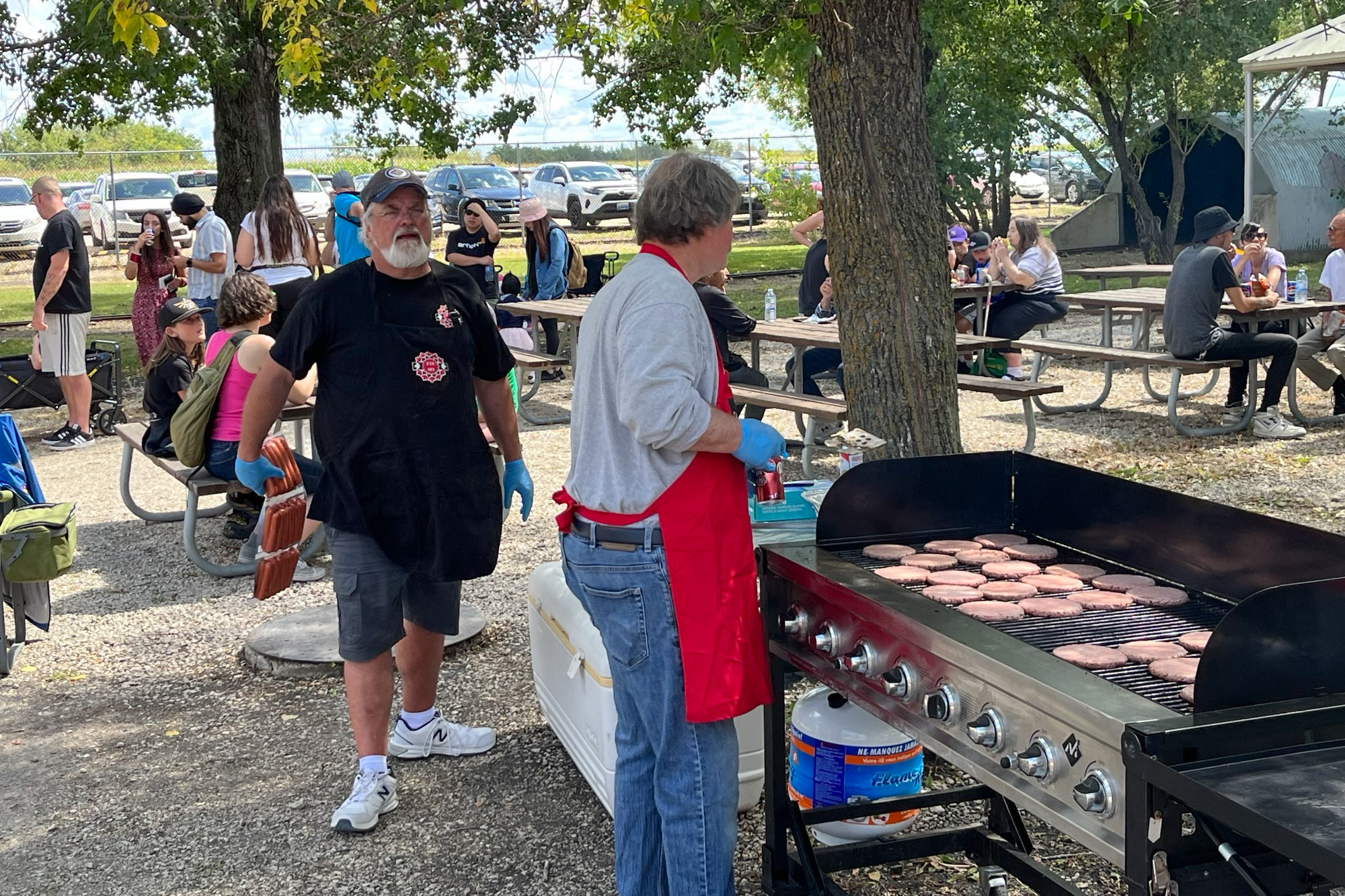 people barbecuing