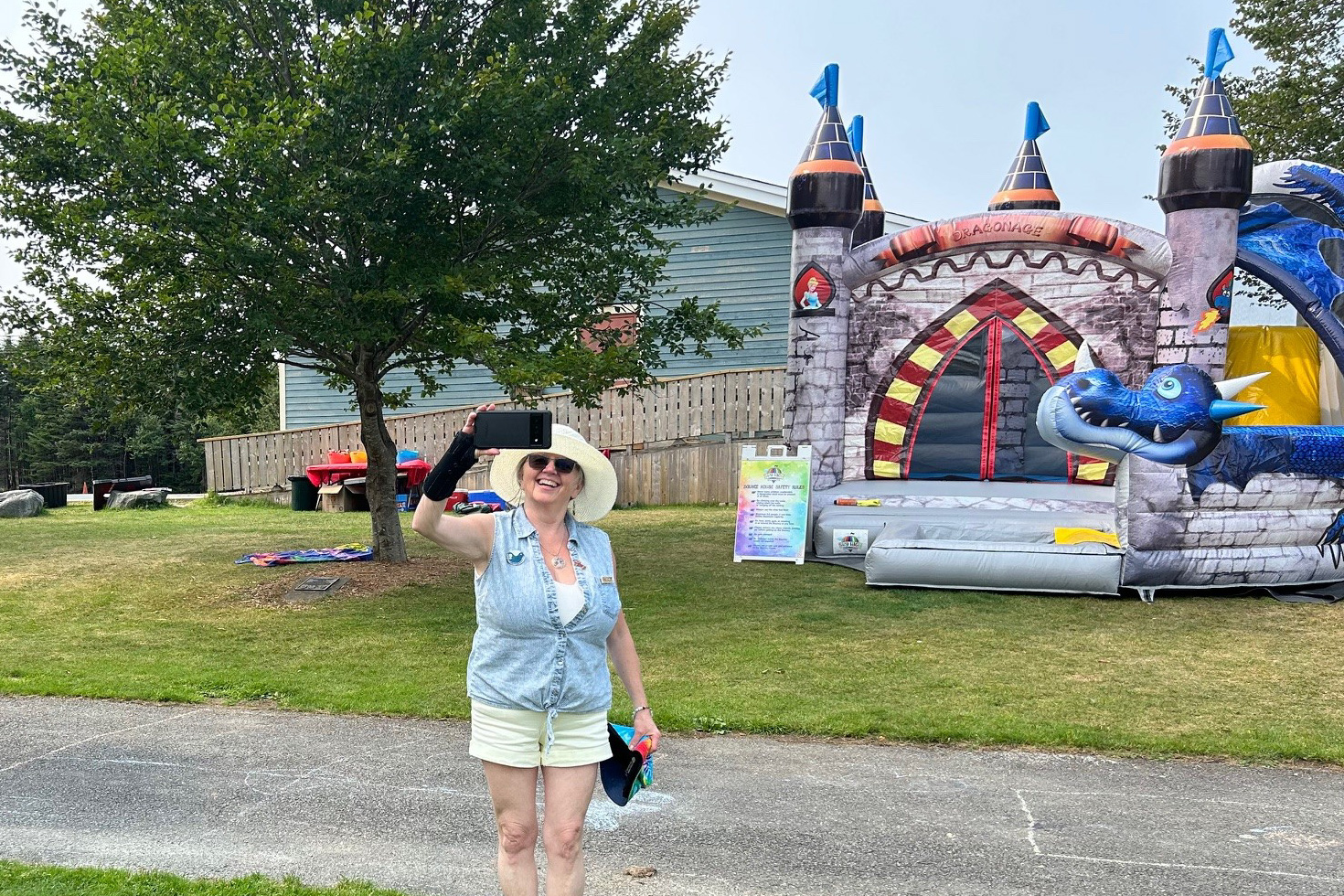 selfie in front of the bouncy castle
