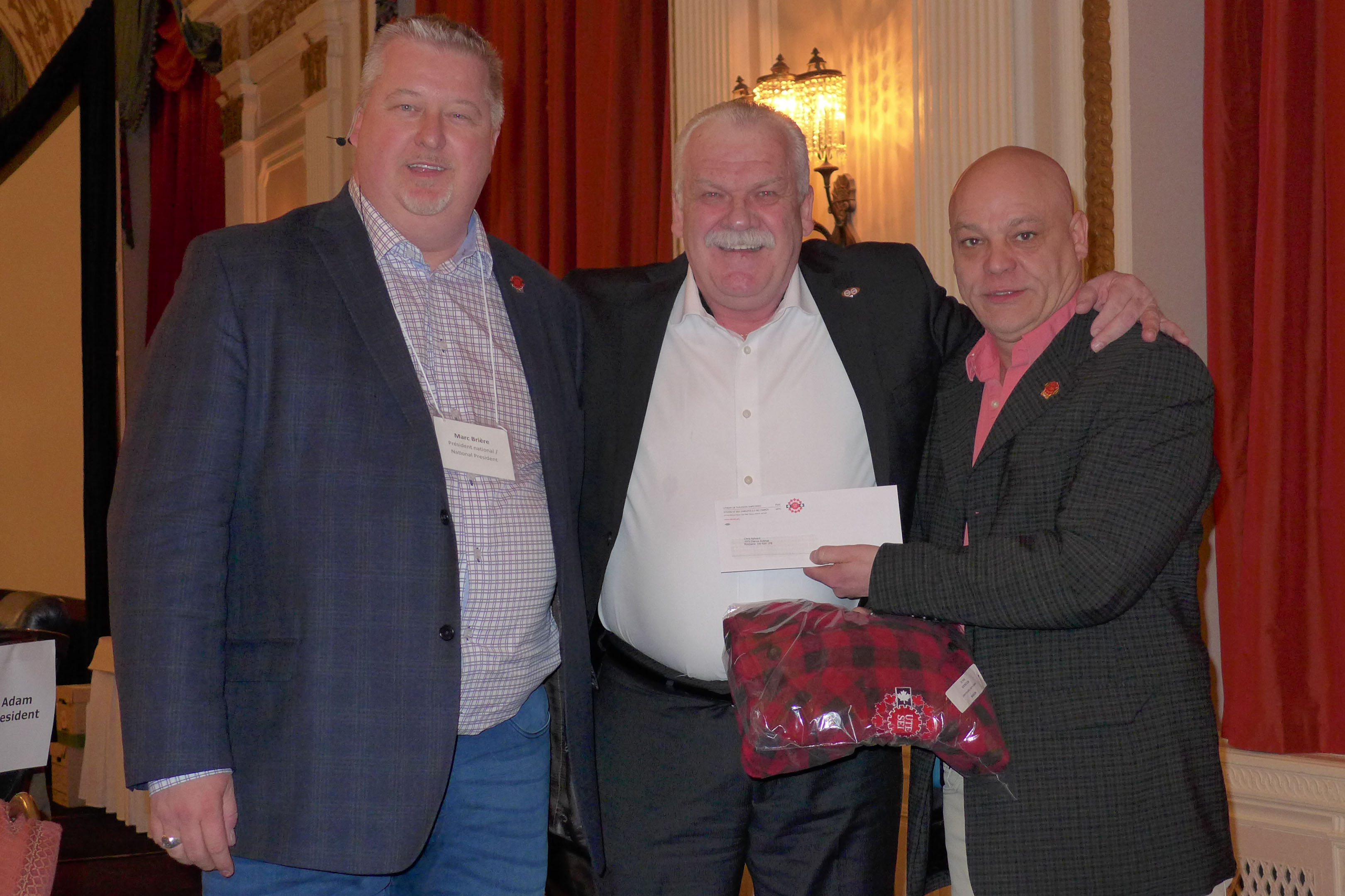 Marc Brière, président national, Chris Aylward, vice-président exécutif national de l'AFPC et Doug Gaetz, 1er vice-président national