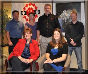 From left to right, bottom row: Gaétanne Rodgers, Vicky's mother and Vicky Rodgers, the scholarship winner; top row: Sylvain Moisan, Steward; Lina Tremblay, Chief Shop Steward; Marc Brière, Local President; and Marc Cloutier, Steward.