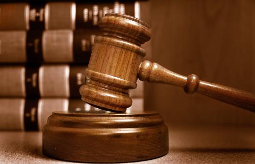 gavel in front of books